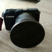 This is the step up ring attached to the 49mm lens with the 77mm filter instu